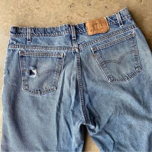 Vintage Levi’s orange tab 560 loose 90s 97 USA denim jeans vintage dirty fade 36